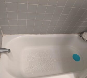 bathtub drain opposite faucet