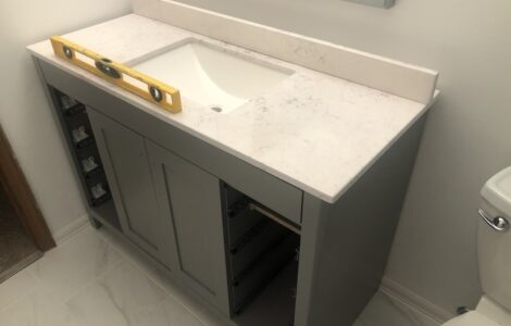 bath vanity against baseboard