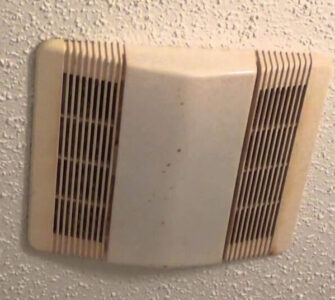 bathroom fan cover discoloration